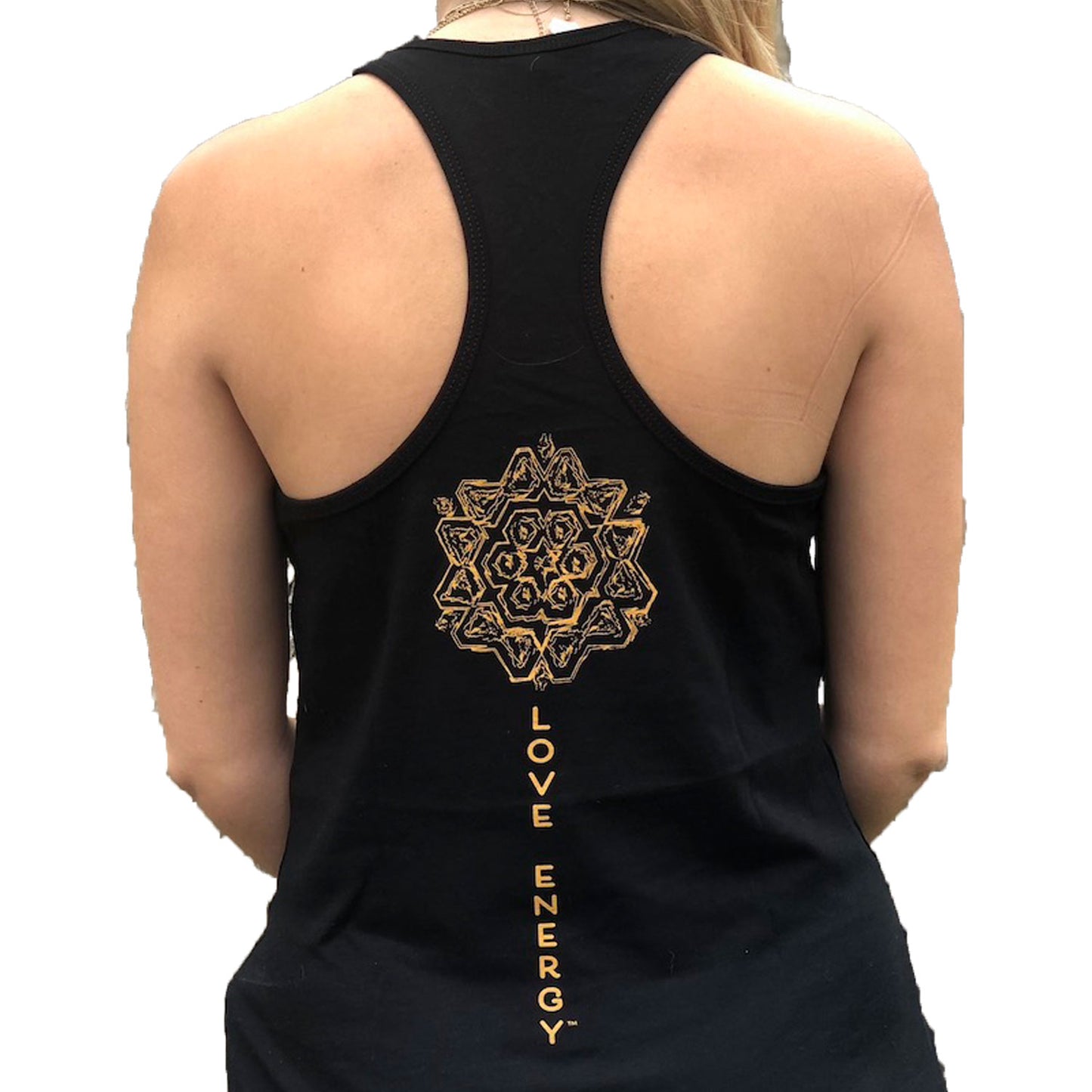 On the back of a black racer back tank top, a unique bronze mandala sits above the words Love Energy that run down the spine. The words Love Energy are on the front left chest.