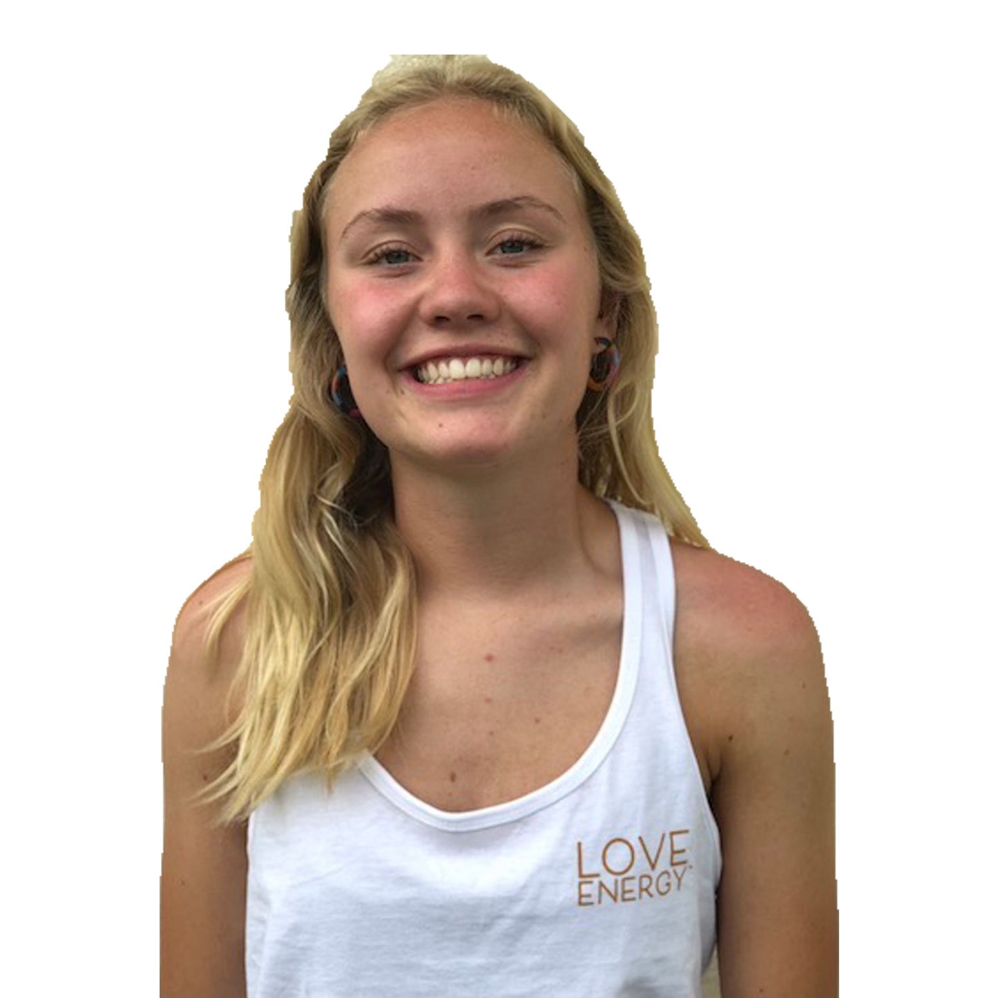 A smiling girl is wearing a white tank top with the words Love Energy on the left chest. The back has a bronze mandala and the words Love Energy underneath running down the spine.